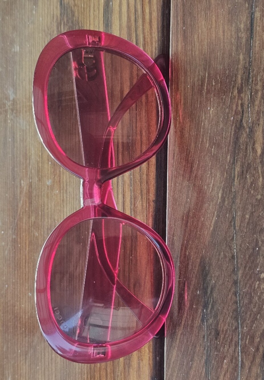 Gucci GG0712S Oversized Round Sunglasses in the translucent fuchsia/pink colorwa